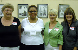 the smiling faces above attende...